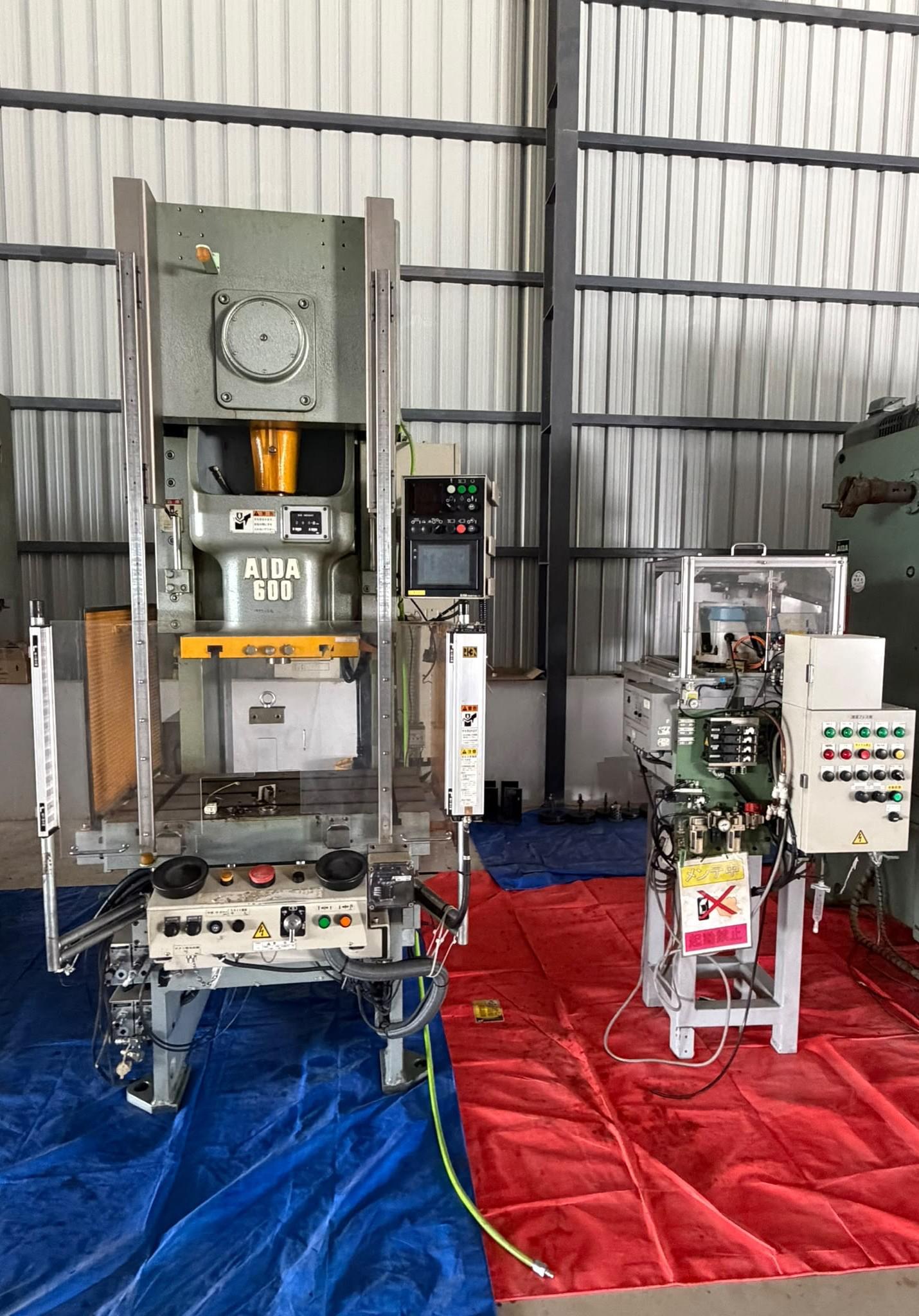 Actual DAINA AIDA 60-ton press in the machinery warehouse